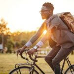 Image of a Business man riding his bike to work