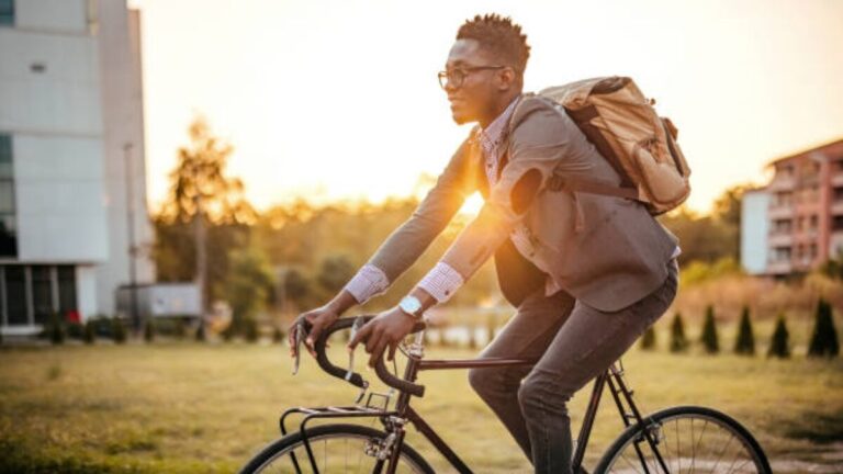 Image of a Business man riding his bike to work